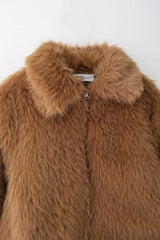 Women's brown fuzzy fur jacket with a turn-down collar.