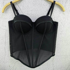 Black mesh lingerie set on a hanger against a light gray background