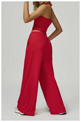 Red jumpsuit worn by a person - side view