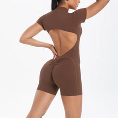 Brown open-back romper worn by a model 
