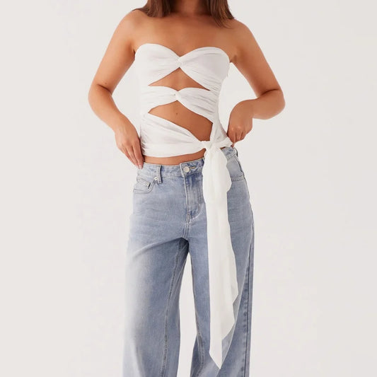 Women's edgy black strapless cutout crop top.

