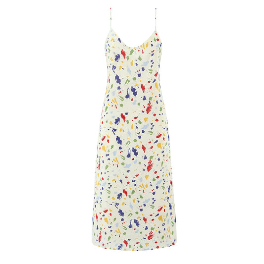 Colorful patterned slip dress on a white background