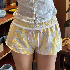Women's playful Y2K striped drawstring shorts.


