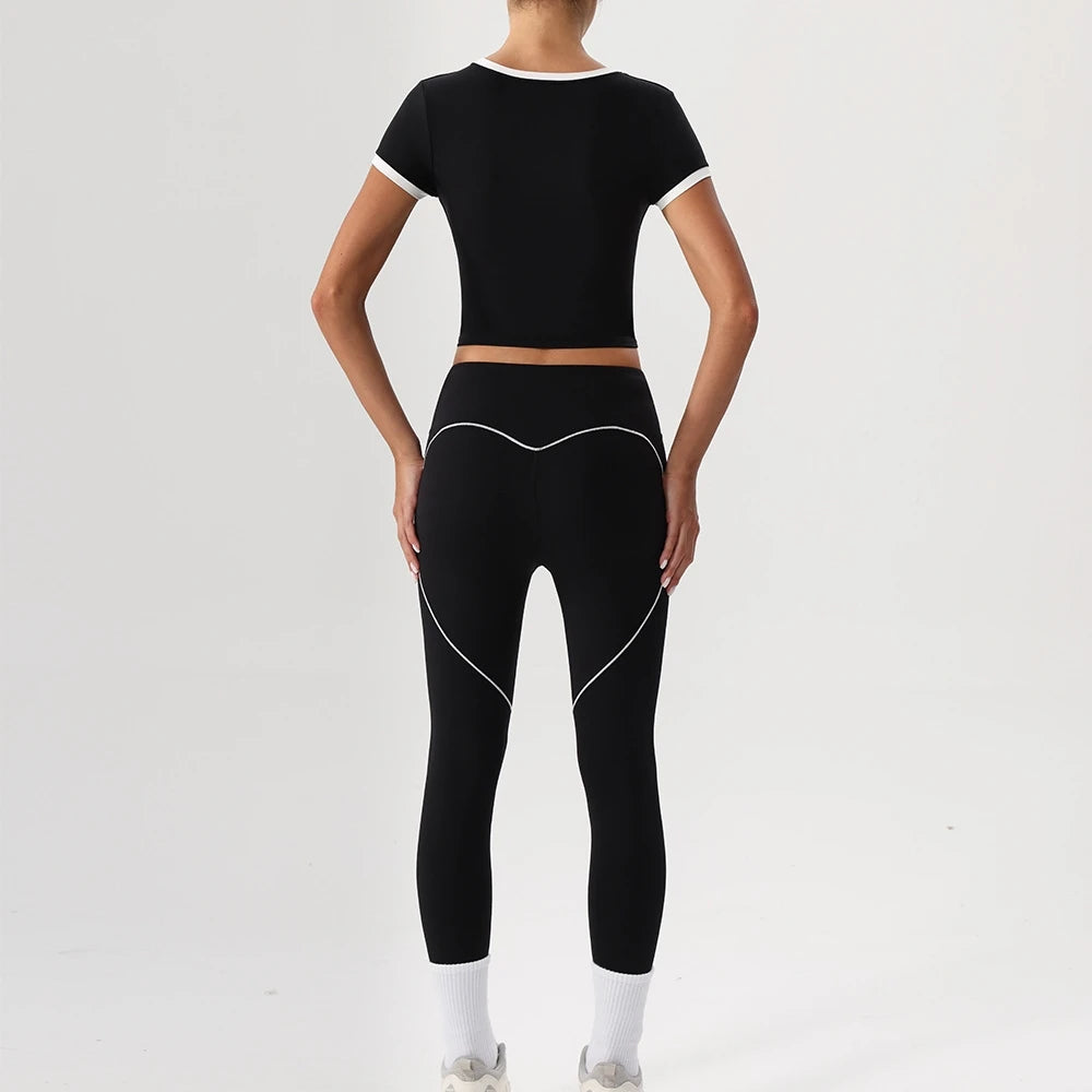 Person wearing a black athletic outfit - back view