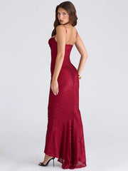 Woman wearing a red evening gown 