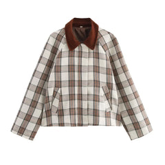 Plaid shirt with brown collar on a white background