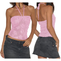 Pink floral top worn by a person with a black denim skirt