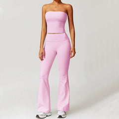 Person wearing a pink strapless top and leggings- front view