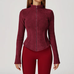 Maroon zip-up jacket worn by a person 