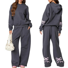 Women's bow print hooded sweatshirt and matching tracksuit set.

