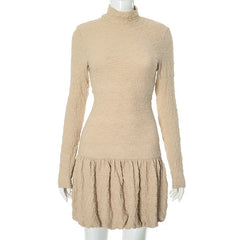 Brown textured balloon mini dress with long sleeves.