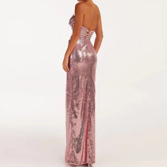 Pink sequin strapless wrap slit midi dress with asymmetrical design and sequin decoration.
