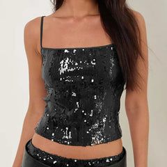 Black sequin top worn by a person- full view