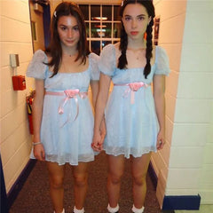 “Women’s Shining Twins costume with square neckline and rosette detail”