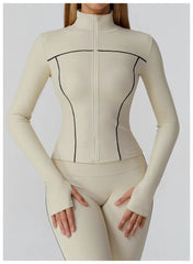 A model wearing a full-length long-sleeve yoga jacket and matching leggings.