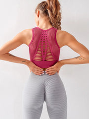 A padded workout bra with a textured fabric and a sleek design.

