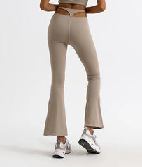 A model posing in the seamless flared pants, highlighting their silhouette.