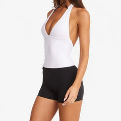 A stylish gym top with a unique, minimalist back design.