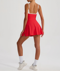 A sporty athletic mini dress with a flared pleated skirt.